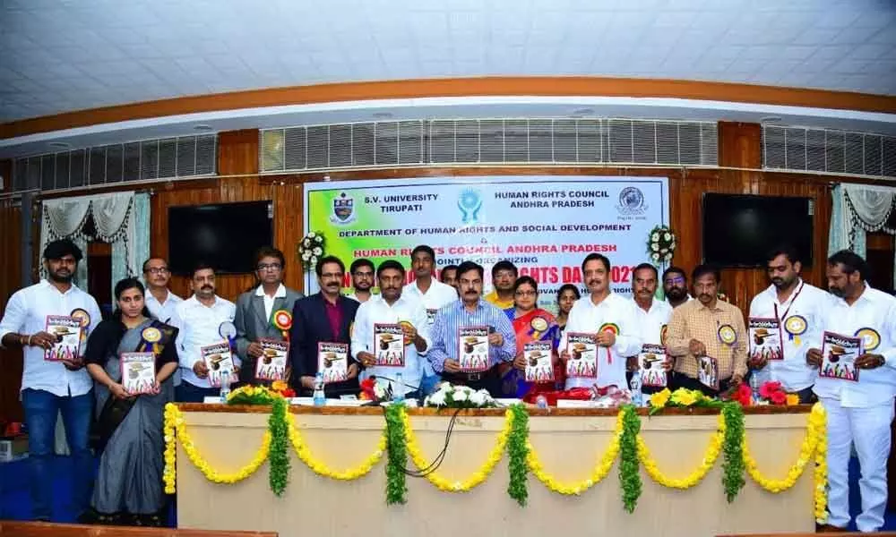 SV University  Vice-Chancellor  Prof K Raja Reddy inaugurating the Human Rights magazine in Tirupati on Friday. SVU Arts College Principal  Prof BV Muralidhar and others are seen