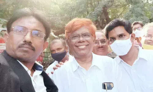 Retired judge of Madras High Court Justice Chandru with some advocates in Vijayawada on Friday