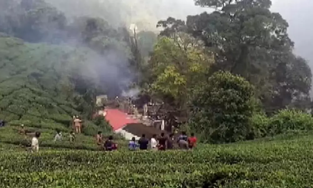 Smoke comes out from an Indian Air Force crashed chopper carrying CDS General Bipin Rawat, his wife, and defence assistants near Coimbatore and Sulur. (Photo| ANI)