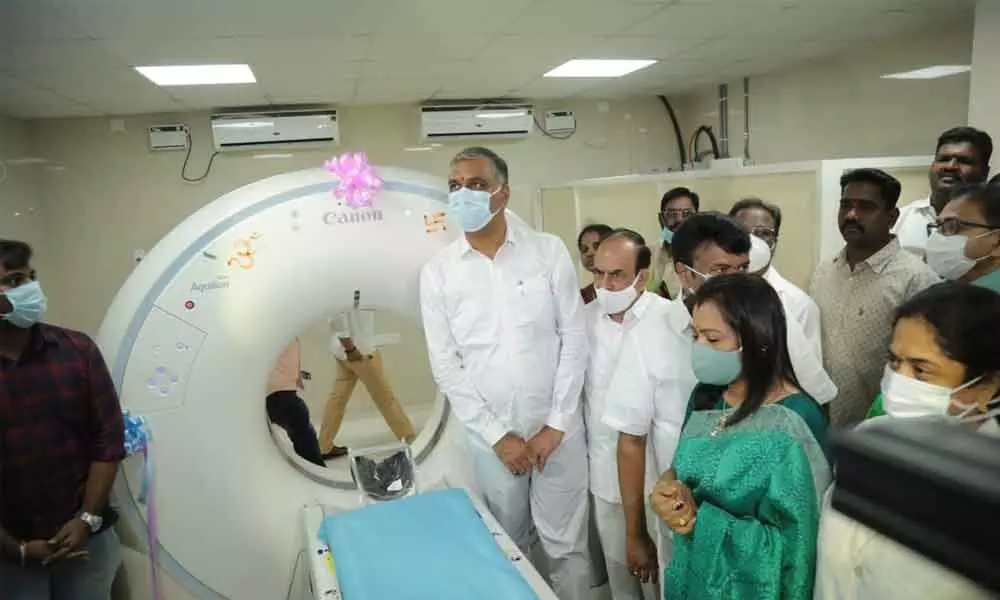 Health Minister T Harish Rao launching an advanced city scan machine at Gandhi Hospital in Hyderabad on Saturday. Later, he went around the hospital, interacting with patients and their attendants and checking the facilities. Photo: Srinivas Setty
