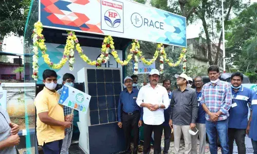 NREDCAP chairman K K Raju and general manager C B Jagadeeswar Reddy explaining the working of swapping station in Tirupati on Saturday