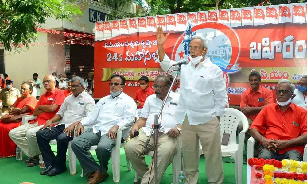 CPM State secretary P Madhu addressing a public meeting in Vijayawada on Sunday