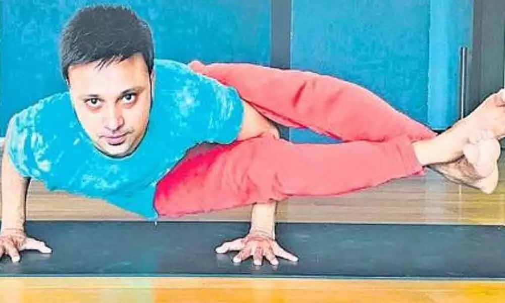 Andhra origin yoga teacher who settled in China finds place in Guinness Book of records