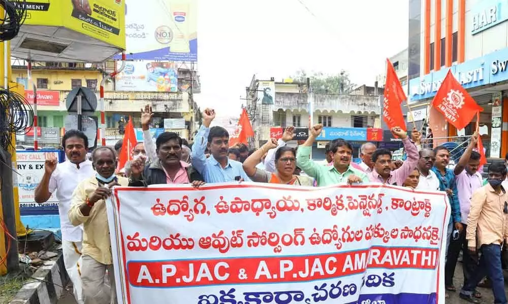 APNGOs Tirupati members staging a rally towards the RDO office from MR Palli Circle in Tirupati on Monday demanding the government to solve their problems