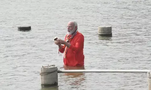 Modi takes holy dip in Ganga before inaugurating Kashi Vishwanath Corridor