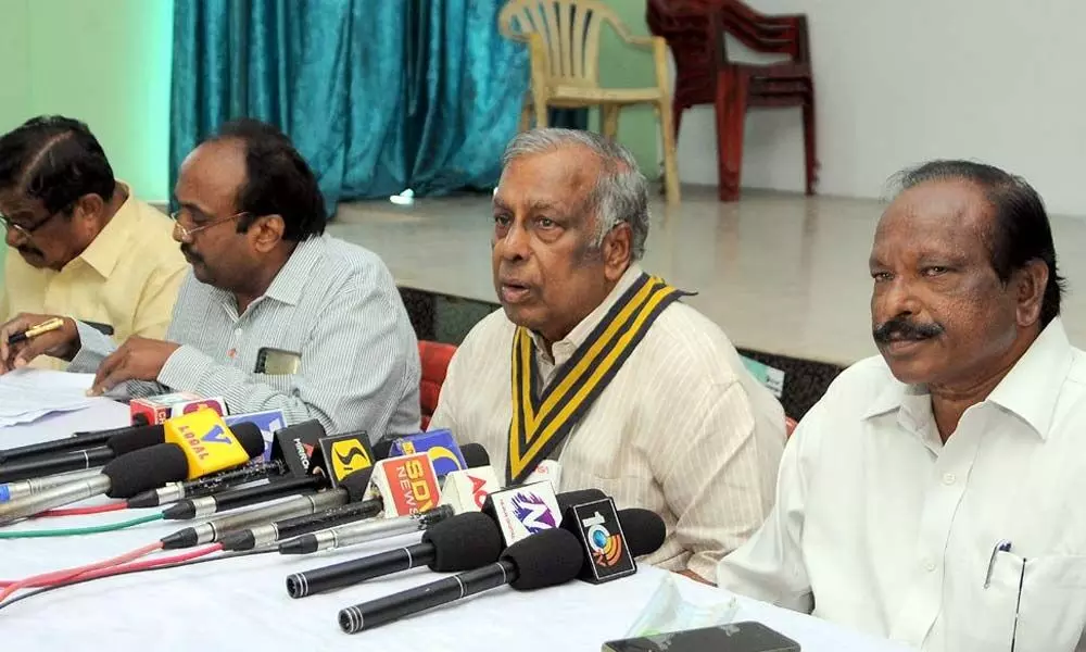 Walkers International president TV Hanumantha Rao addressing a press conference in Vijayawada on Tuesday