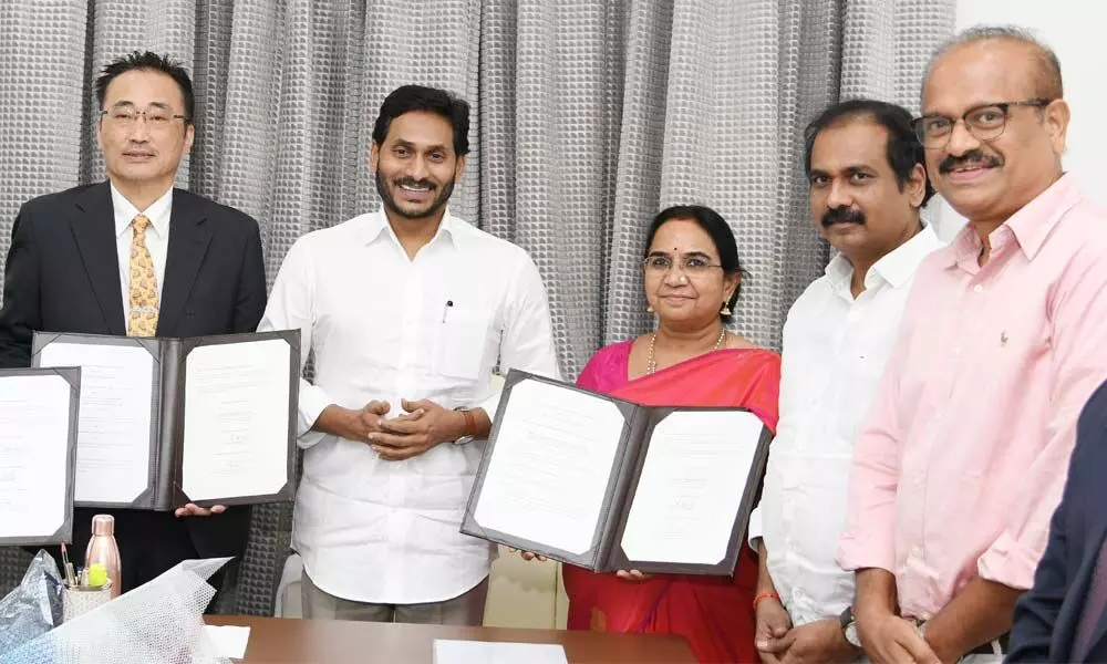 State government officials exchange agreement copies with FAO and ICAR representatives in the presence of Chief Minister  Y S Jagan Mohan Reddy at Tadepalli on Tuesday
