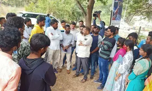 Warangal DCC president Naini Rajender Reddy interacting with the students at Kakatiya University on Wednesday