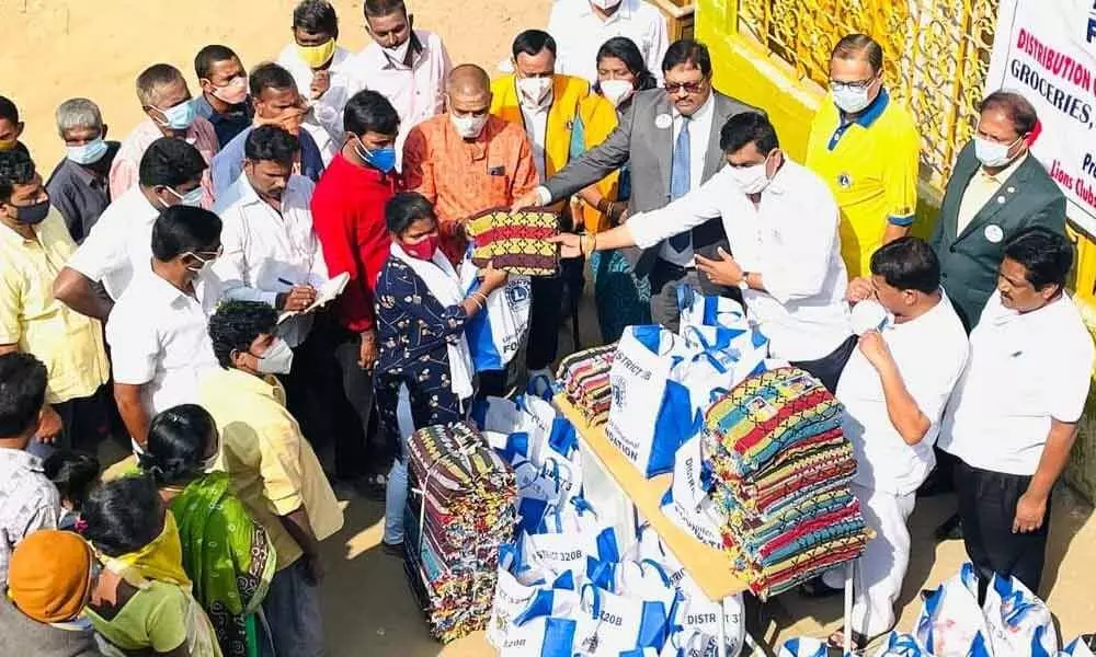 Lions Club District 320 B distributes groceries to poor