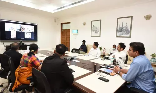 Minsiter KT Rama Rao interacts with Genpact officials in Hyderabad