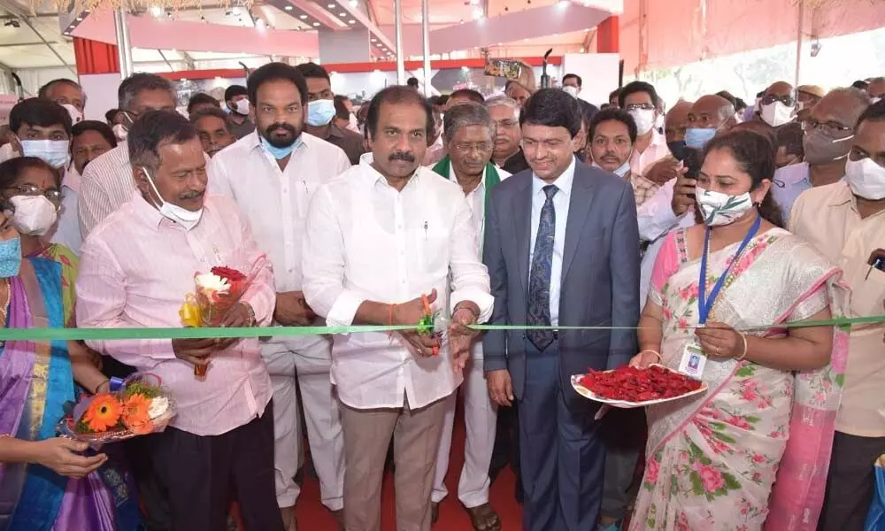 Minister for Agriculture K Kanna Babu inaugurating an agri technology conference at Lam in Guntur on Friday. District Collector Vivek Yadav also seen
