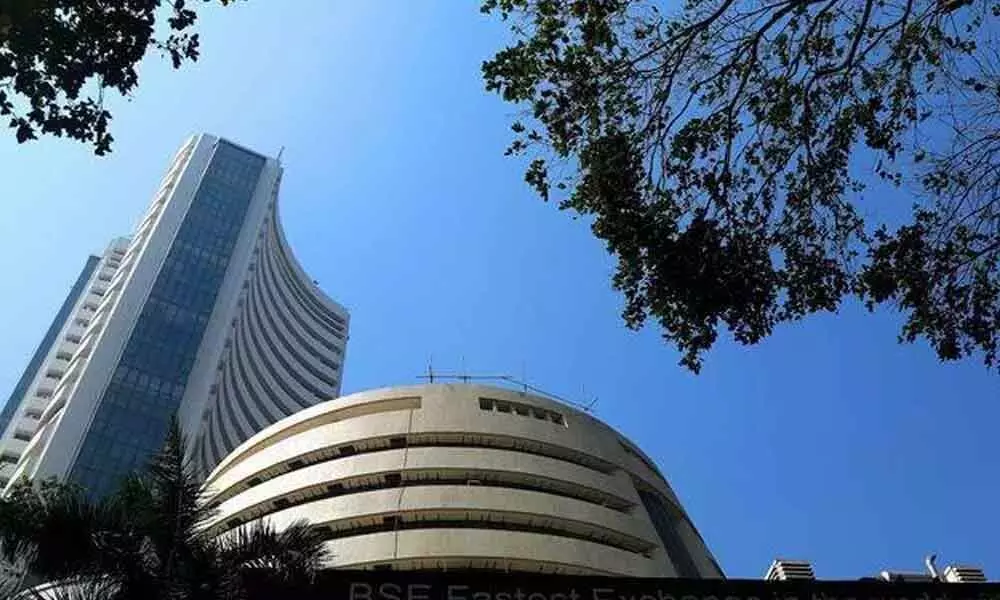 Markets close with modest gains; Sensex rises 385 points & Nifty trades at 17,073