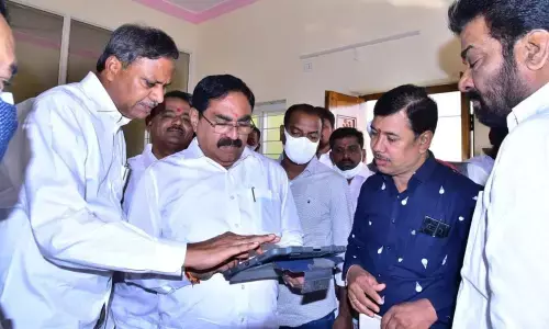 Minister for Panchayat Raj Errabelli Dayakar Rao and MLC Palla Rajeshwar Reddy at the new Jangaon Collectorate on Friday