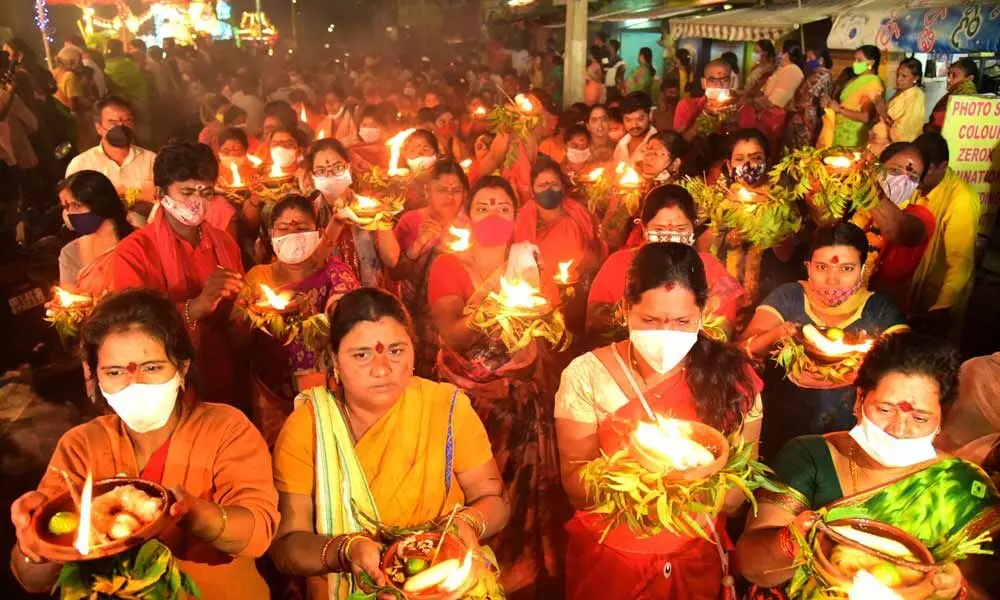 Women devotees taking part in Kalasa Jyothy procession in Vijayawada on Saturday 	Photo: Ch V Mastan