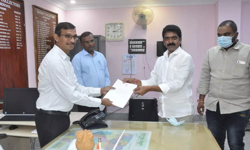 Zilla Parishad chairman, Malkireddy Venkata Subba Reddy handing over his resignation to the district collector  P Koteshwara Rao on Saturday