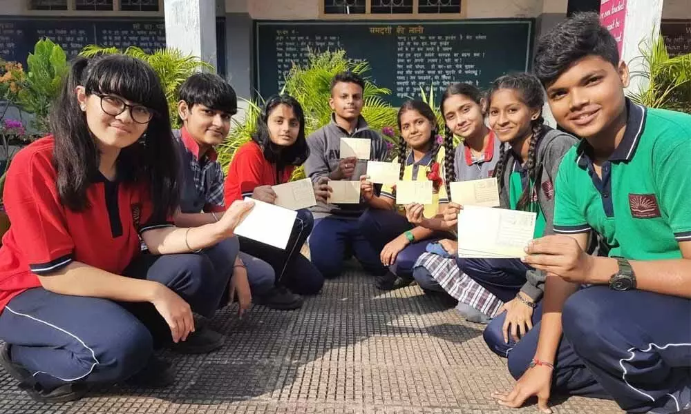 Students of Kendriya Vidyalaya No.2 Nausenabaugh taking part in the post card writing competition in Visakhapatnam