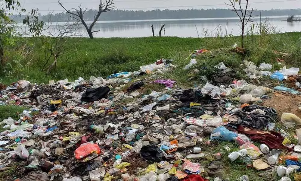 Hennagara Lake is polluted with construction debris, garbage and industrial effluents