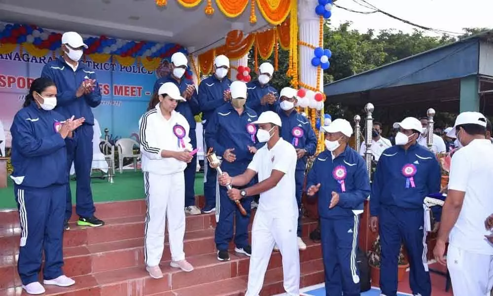 SP M Deepika lighting torch at the inaugural ceremony of District Police Sports Meet in Vizianagaram on Monday