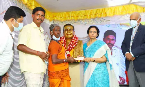Nara Bhuvaneswari, Managing Trustee of NTR Trust, distributing cheques worth  Rs 1 lakh each  to 48 families of flood victims in Tirupati on Monday