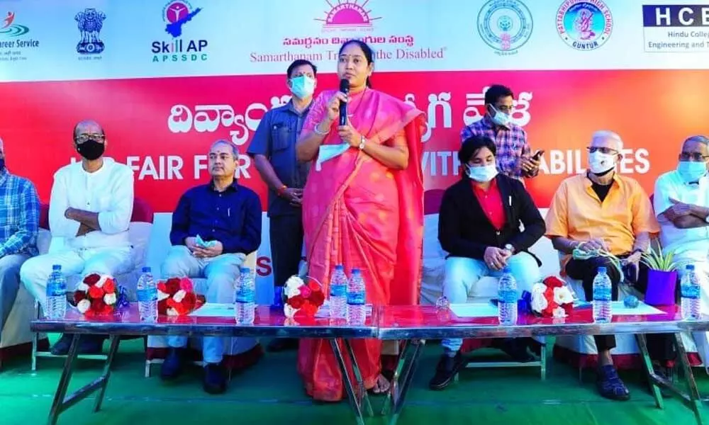 Home Minister Mekathoti Sucharitha speaking at a programme after inaugurating a job mela for differently-abled, in Guntur on Tuesday