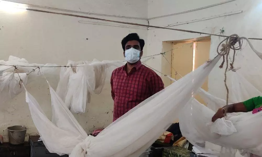 ITDA Project Officer CV Praveen Aditya inspecting mosuqiote nets in Tribal Residential School and Tribal Primary School in Nallagonda on Tuesday