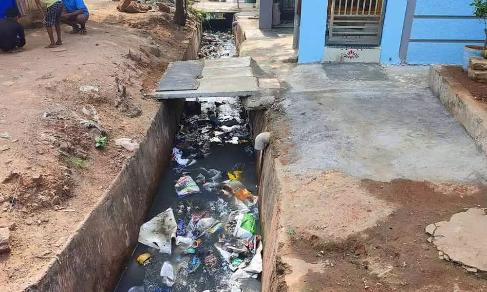 Domestic wastewater and plastic stagnated in the main drain