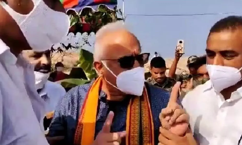 Former Union Minister and Ramatheertham temple chairman P Ashok Gajapathi Raju having a heated argument with officials at the temple site in Vizianagaram district  on Wednesday