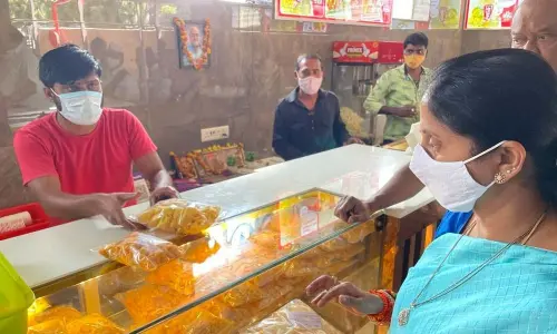 Joint Collector K Madhavi Latha inspecting food items at a cinema theatre in Vijayawada on Wednesday