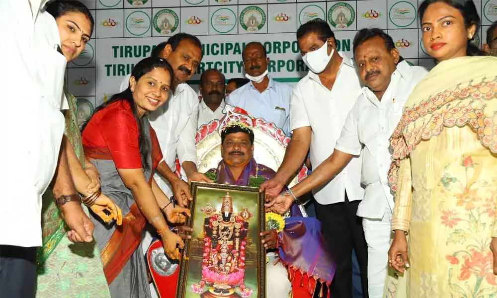 MLA Bhumana Karunakar Reddy felicitating senior kabaddi players at Lalitha Kala Praganam in Tirupati on Thursday