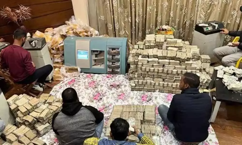 Rs 150 crore in cash seized in tax raids on UP firm
