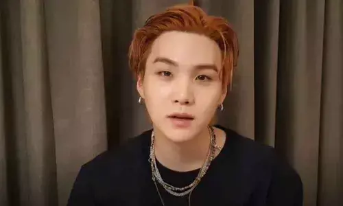 Korean-pop band BTS member Suga