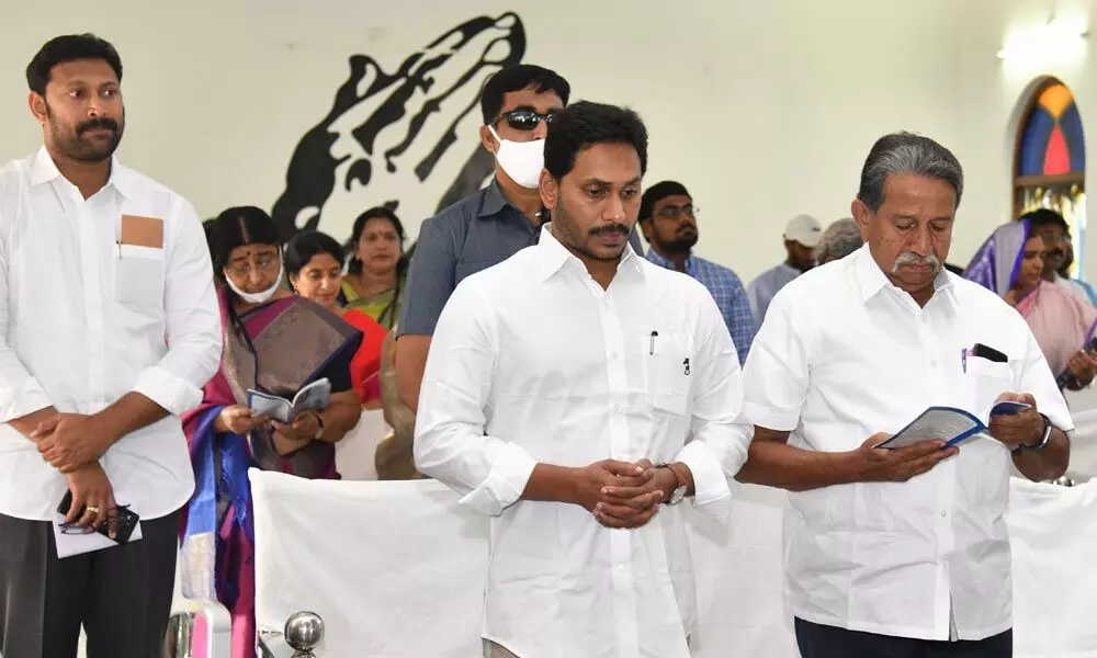 Chief Minister Y S Jagan Mohan Reddy taking part in special prayers at the CSI Church at Pulivendula in Kadapa district on Saturday on the occasion of Christmas