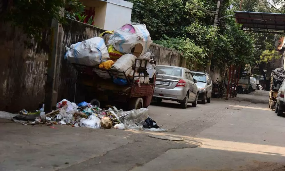 Yellareddyguda residents fume over sewage overflow, garbage piles in lanes