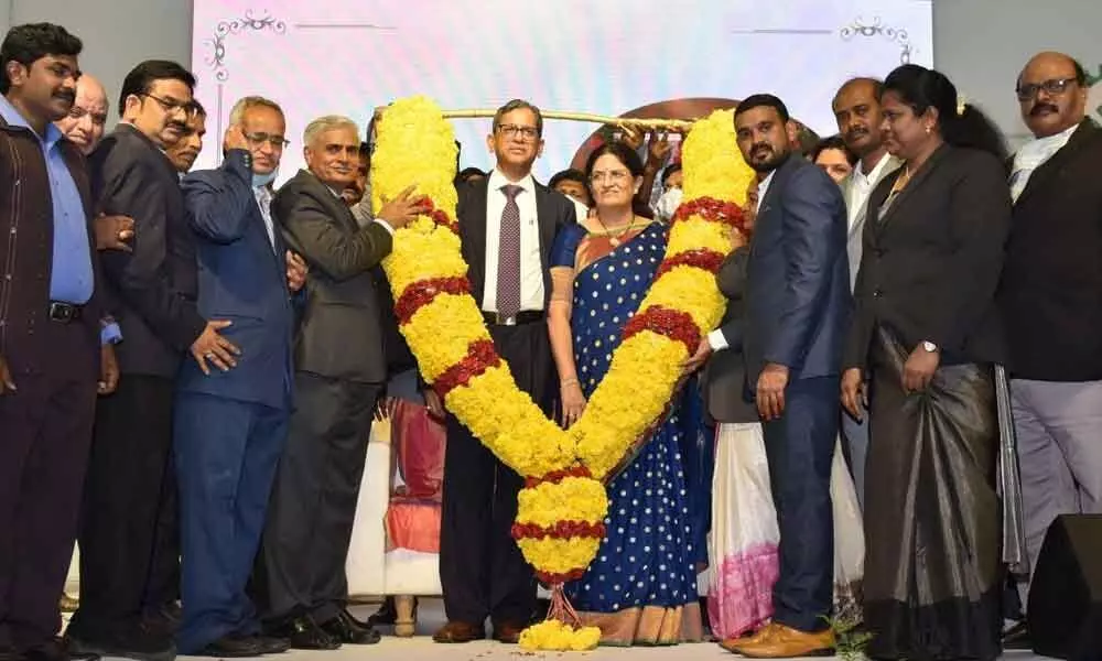 Chief Justice of India N V Ramana and his wife Shivamala being felicitated at a function organised jointly by the AP High Court Advocates Association and Andhra Pradesh Bar Council in Vijayawada on Sunday