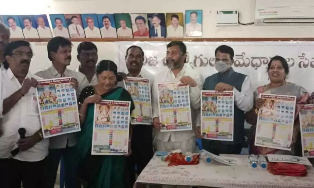Minister for Panchayat Raj Peddireddi Ramachandra Reddy unveiling YSR students wing calendar in Tirupati on Sunday