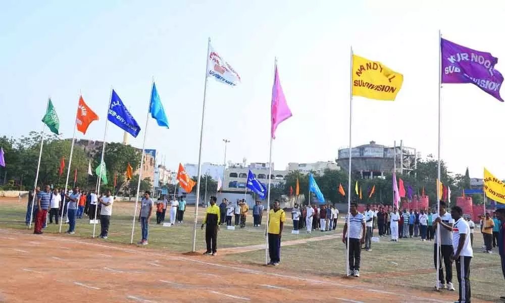 Sport personnel participating in the District Police Sports and Games Meet-2021 held at police parade grounds in Kurnool on Sunday