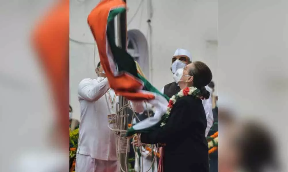 Congress partys flag falls off the pole while being hoisted by partys interim president Sonia Gandhi on the partys 137th Foundation Day, in New Delhi on Tuesday