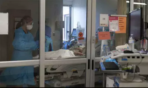 World hits record daily Covid cases, disrupts holiday season