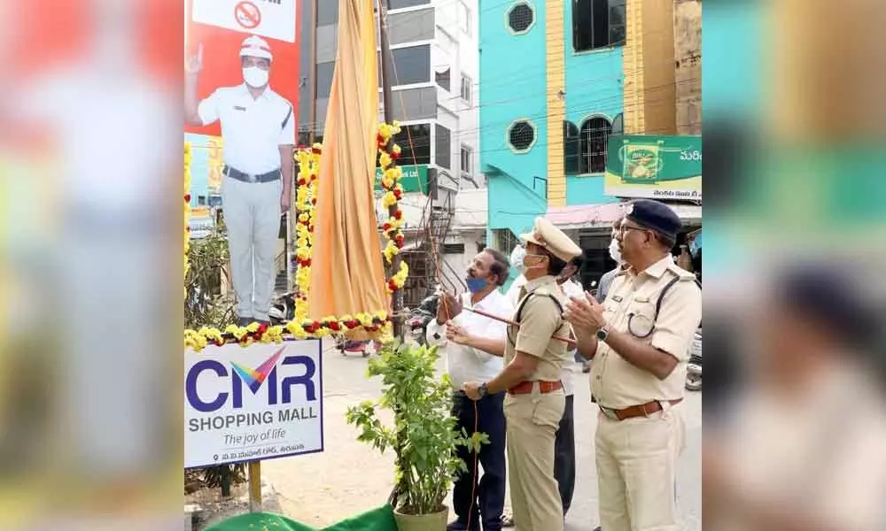 Urban SP Appala Naidu inaugurating traffic police  cut-out at Mahati Auditorium in Tirupati on Wednesday