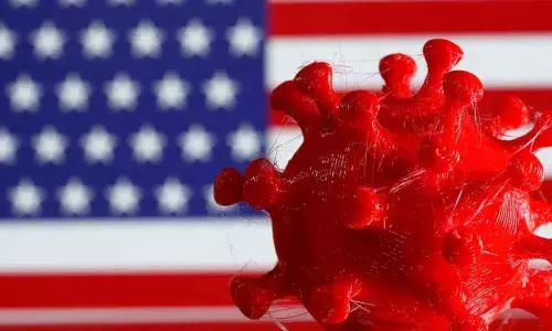 US sets daily COVID-19 cases record