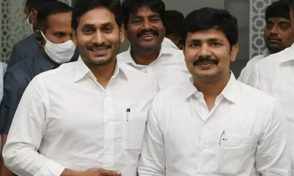 YSRCP Tirupati Lok Sabha bypoll winner Dr M Gurumoorthy with party chief Y S Jagan Mohan Reddy (file picture)