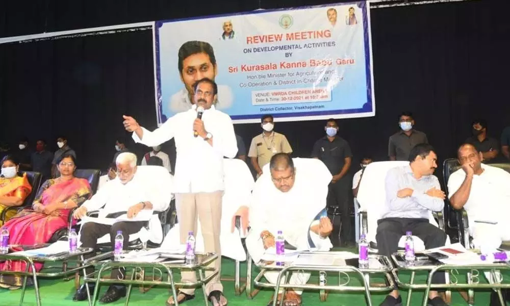District in-charge Minister K Kannababu speaking at a review meeting in Visakhapatnam on Thursday