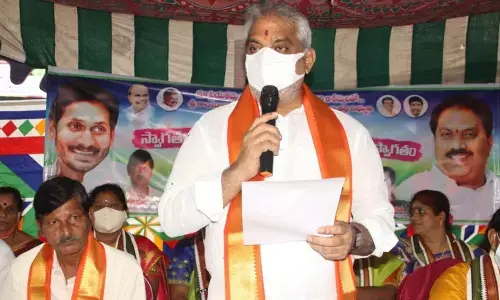 MLA Malladi Vishnu speaking at an oath-taking ceremony of Kanchanapalli Kanakamba Trust Board members in Vijayawada  on Thursday