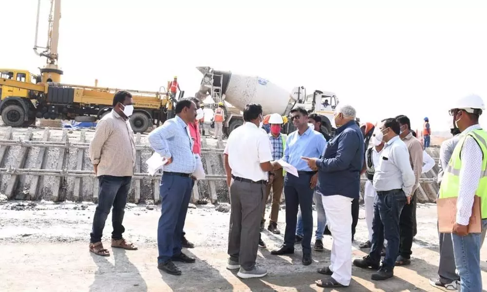 Collector D Anudeep having a discussion with officers during the inspection of SSMPP works in Aswapuam mandal in Kothagudem district on Friday