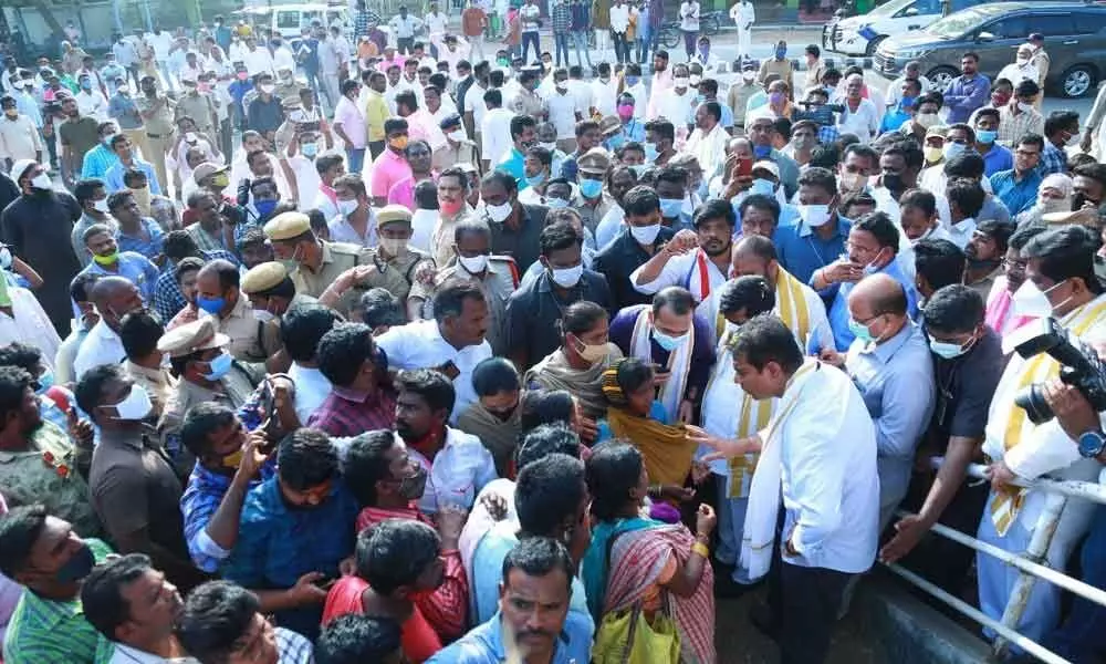 Urban Development Minister KT Rama Rao interacting with a woman during his padayatra in Nalgonda on Friday