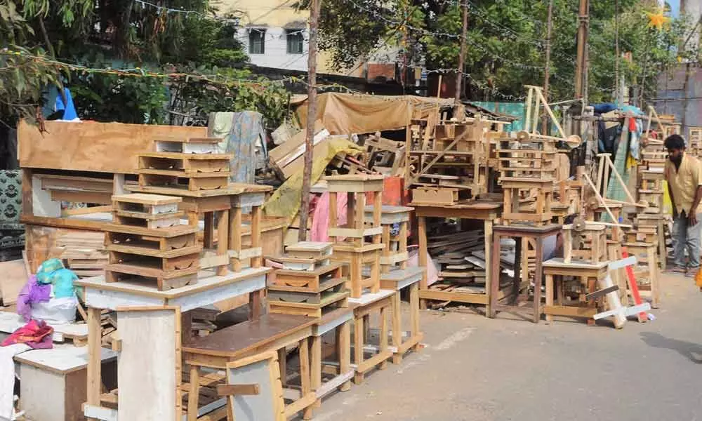 Wooden items occupy road