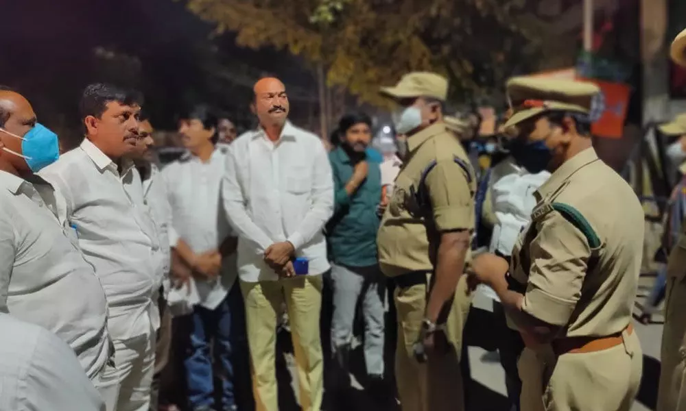 The police stopping the Khammam BJP leaders in Karimnagar on Sunday