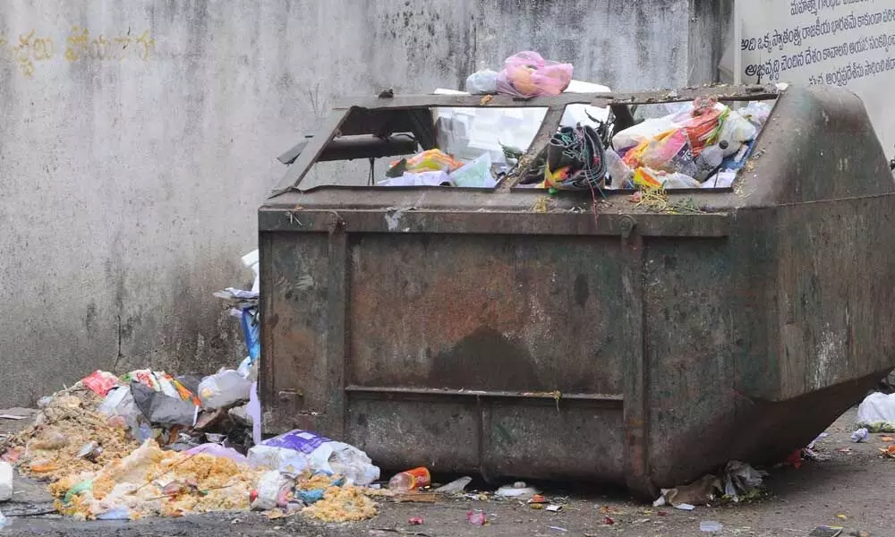 Garbage bin near mosque