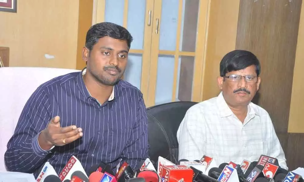 Municipal Commissioner K Dinesh Kumar along with RDO Hussain Saheb addressing the media in Nellore on Monday