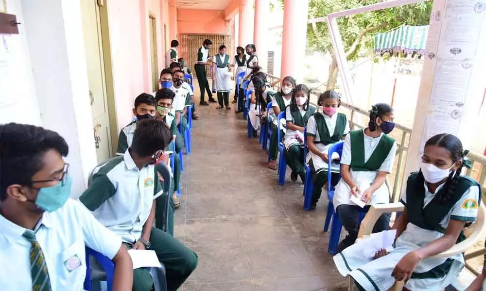 Students at a vaccination centre at Satyanarayanapuram in Vijayawada on Monday